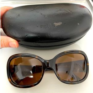 Tortoise shell Prada sunglasses and case